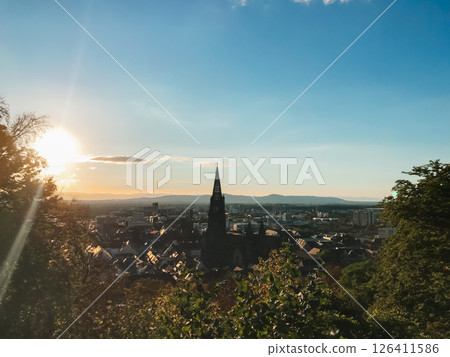 A beautiful city view with a large church in the background A beautiful city view with a large church in the background 126411586
