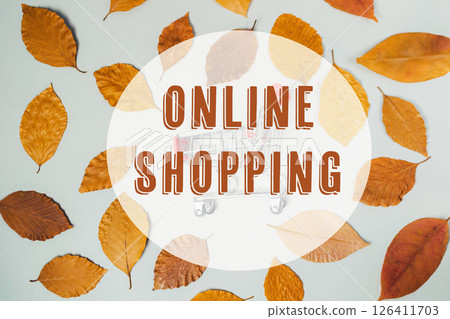 Leafy background with a shopping cart on it Leafy background with a shopping cart on it 126411703