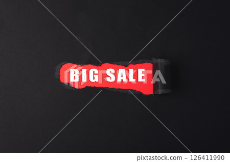 Red sign with the word big sale written on it Red sign with the word big sale written on it 126411990