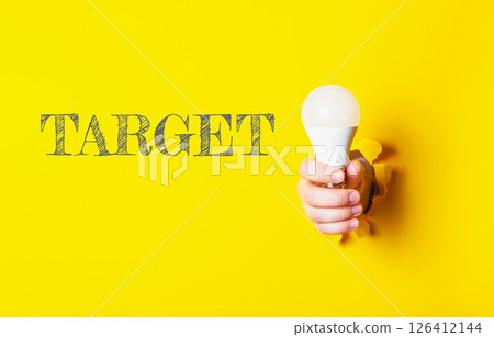 Concept of creativity and innovation, as the person is holding a light bulb Concept of creativity and innovation, as the person is holding a light bulb 126412144