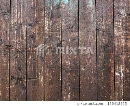 A wooden background with a lot of scratches and marks 126412235