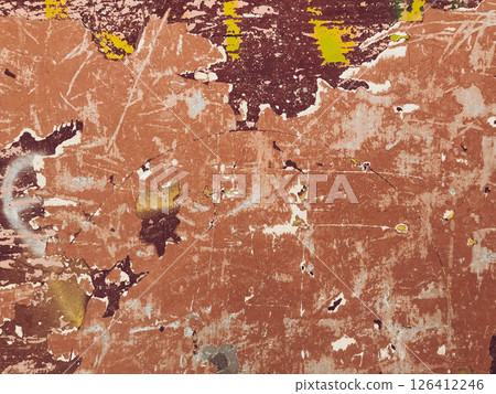 A wall with a lot of paint on it and a lot of scratches 126412246