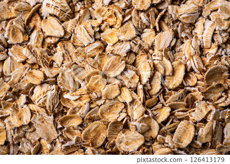 Textured oatmeal grains on white background 126413179