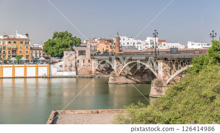 Puente de Isabel II bridge timelapse hyperlapse over the Guadalquivir River, Seville, Spain 126414986