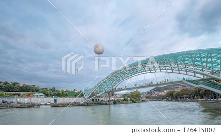 Timelapse panorama of the Bridge of Peace, a bow-shaped pedestrian bridge in Tbilisi, Georgia 126415002