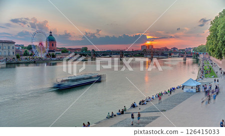 Aerial view of Port de la Daurade park along the Garonne River timelapse in Toulouse, France. Aerial view of Port de la Daurade park along the Garonne River timelapse in Toulouse, France. 126415033
