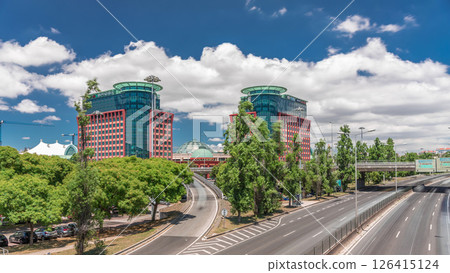 Aerial timelapse hyperlapse of Centro Colombo and modern office buildings in Lisbon. Portugal. Aerial timelapse hyperlapse of Centro Colombo and modern office buildings in Lisbon. Portugal. 126415124