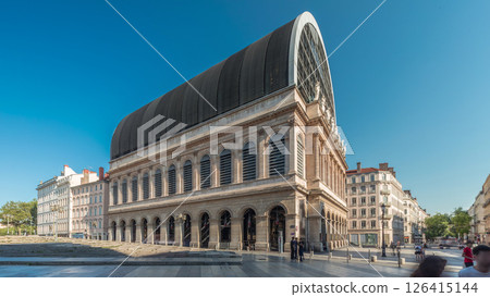 Hyperlapse of Lyon's opera house featuring neoclassical architecture combined with a modern glass dome roof. France 126415144