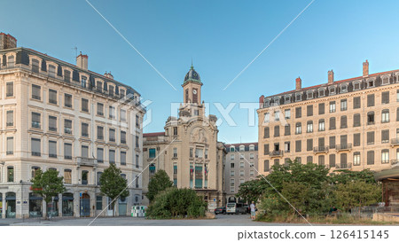 Hyperlapse of Place Antonin Jutard and the Mutuality Palace facade from the waterfront near Guillotiere Bridge in Lyon, France. 126415145