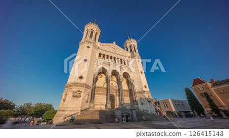 Hyperlapse front view of the Basilica of Notre Dame de Fourviere during sunset in Lyon, France. 126415148