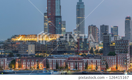 Panoramic aerial night to day timelapse of Katendrecht peninsula and Maashaven harbour in Rotterdam, The Netherlands. Panoramic aerial night to day timelapse of Katendrecht peninsula and Maashaven harbour in Rotterdam, The Netherlands. 126415167