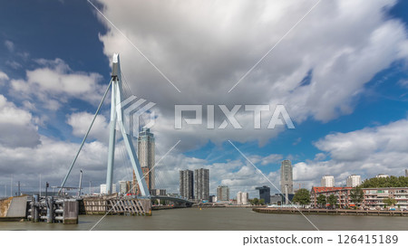 Erasmus Bridge timelapse hyperlapse, spanning the Maas River in Rotterdam, Netherlands Erasmus Bridge timelapse hyperlapse, spanning the Maas River in Rotterdam, Netherlands 126415189