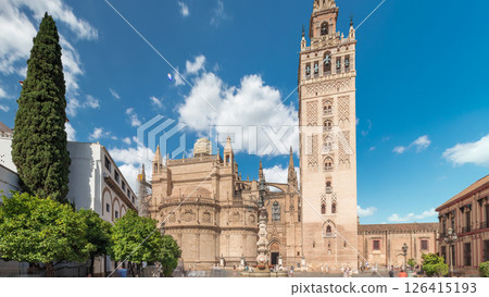 Seville Cathedral and Giralda Tower timelapse hyperlapse, Spain Seville Cathedral and Giralda Tower timelapse hyperlapse, Spain 126415193