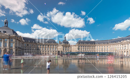 Place de la Bourse and Miroir d'eau timelapse hyperlapse in Bordeaux, France, reflecting historic architecture 126415205