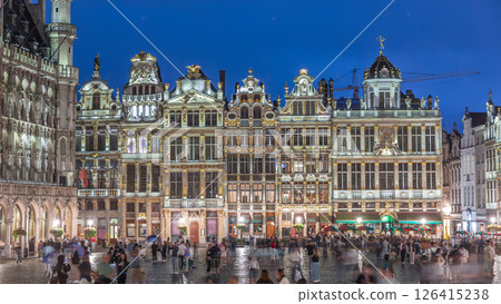 Illuminated Grand Place Guilds facade day to night timelapse in Brussels, Belgium. 126415238