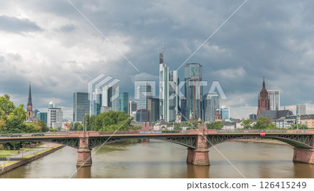 Aerial hyperlapse of Frankfurt skyline with Main River and Ignatz Bubis Bridge. Frankfurt, Germany Aerial hyperlapse of Frankfurt skyline with Main River and Ignatz Bubis Bridge. Frankfurt, Germany 126415249