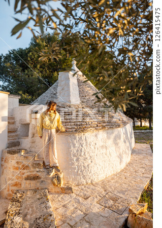 Walking Past a Trullo in Puglia 126415475