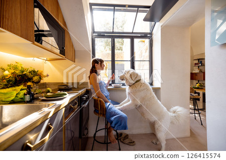 Morning Snack with a Furry Friend 126415574