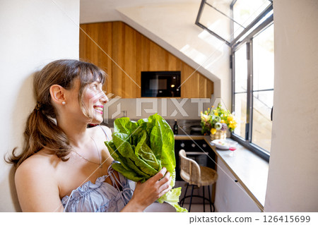 Joyful Cooking Moment in Sunny Italian Kitchen Joyful Cooking Moment in Sunny Italian Kitchen 126415699