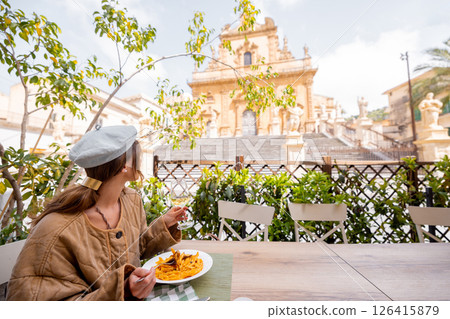 Sicilian pasta alla Norma with cathedral view 126415879