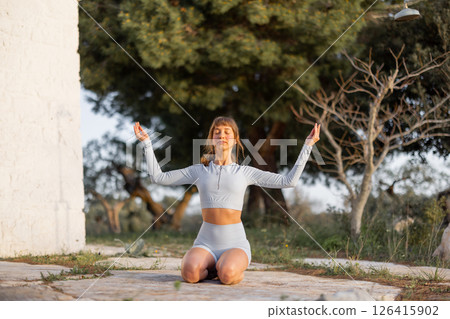 Balance and Strength at Sunrise 126415902