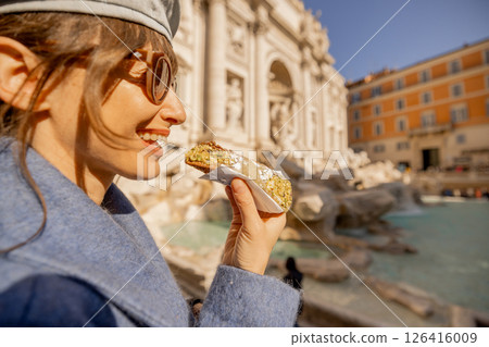 Smiling with a Cannolo by Trevi Fountain 126416009