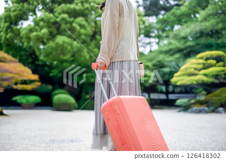Portrait of a woman traveling Portrait of a woman traveling 126418302