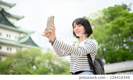 Portrait of a woman traveling 126418349