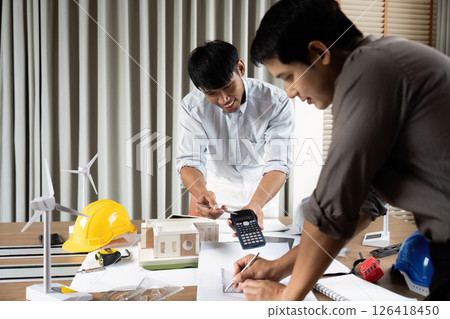 Sustainability engineers working together on innovative designs Sustainability engineers working together on innovative designs 126418450