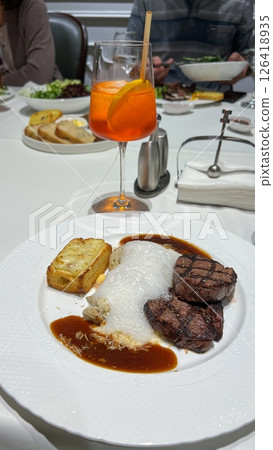 Gourmet Steak Dinner with Aperol Spritz Fine Dining Experience with Culinary Artistry 126418935