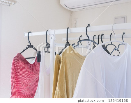 Drying clothes indoors Housework Drying clothes indoors Housework 126419168