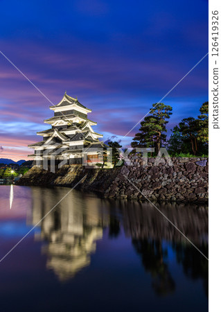 Matsumoto Castle lit up at dusk, Matsumoto City, Nagano Prefecture Matsumoto Castle lit up at dusk, Matsumoto City, Nagano Prefecture 126419326