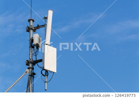 Telecommunication towers a close-up look at urban technology and connectivity in clear skies Telecommunication towers a close-up look at urban technology and connectivity in clear skies 126419773