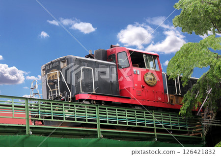 The Sagano train departs from Kameoka Torokko Station for Kyoto. The Sagano train departs from Kameoka Torokko Station for Kyoto. 126421832