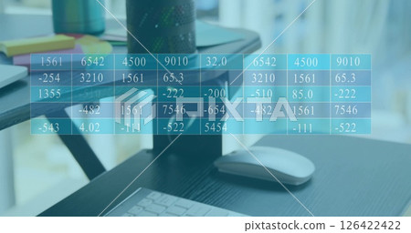 Image of financial data processing over desk in office Image of financial data processing over desk in office 126422422