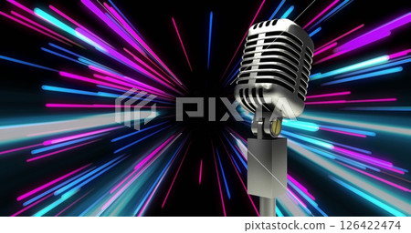 Retro microphone with colorful light streaks image in background 126422474