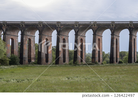 rchitectural splendour of Ouse Valley Viaduct or Balcombe Viaduct (Railway viaduct) carries the Brighton Main Line over the River Ouse in Sussex. 126422497