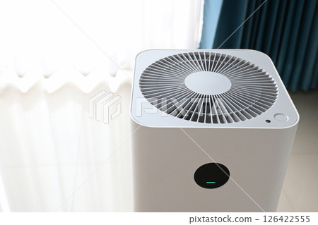air purifier technology clean dust pm 2.5 in living room inside home for healthy care 126422555