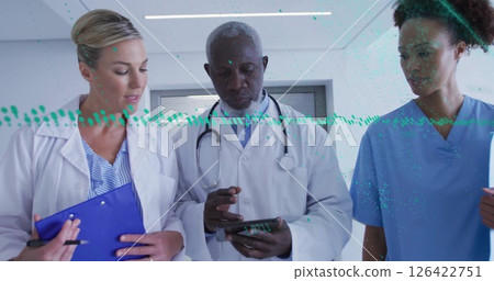 Image of data processing and diagrams over diverse doctors talking 126422751