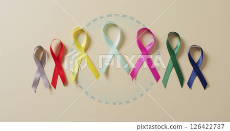 Colorful awareness ribbons with circular data image over beige background Colorful awareness ribbons with circular data image over beige background 126422787