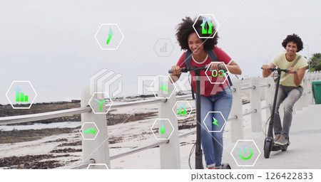 Riding electric scooters, people with environmental data image over coastal pathway 126422833