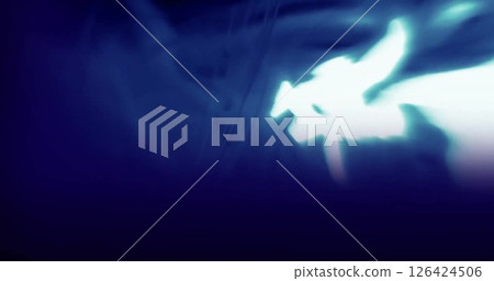 Image of glowing light trails moving over blue background 126424506