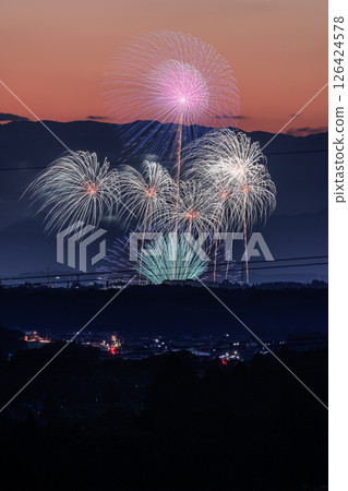 Fireworks at dusk Fireworks at dusk 126424578
