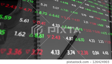 Image of financial data processing over notebook 126424903