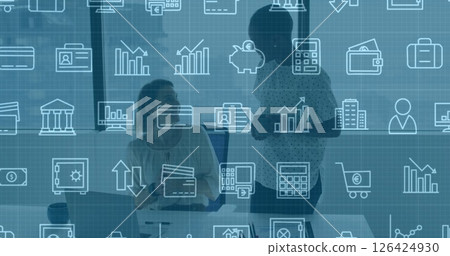 Business icons and data analytics image over two colleagues discussing in office Business icons and data analytics image over two colleagues discussing in office 126424930