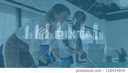 Analyzing data on laptop, business professionals with financial charts image over them Analyzing data on laptop, business professionals with financial charts image over them 126424934