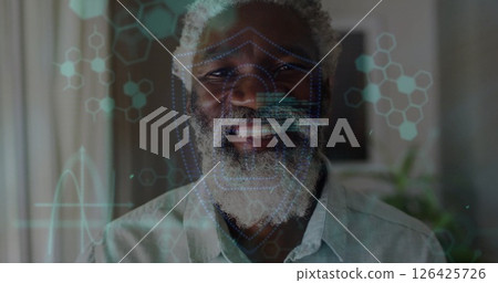 Image of data processing over happy senior african american man at home 126425726