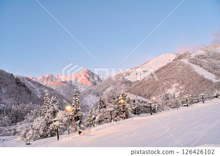 A beautiful ski resort illuminated by the morning sun 126426102