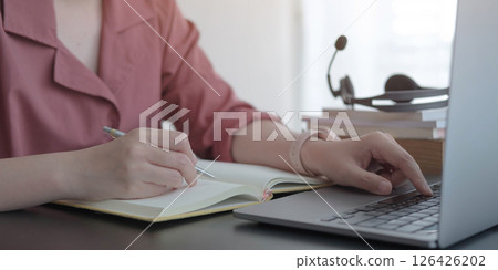 Business woman working in finance and accounting Analyze financial budget at home , Work from home concept Business woman working in finance and accounting Analyze financial budget at home , Work from home concept 126426202