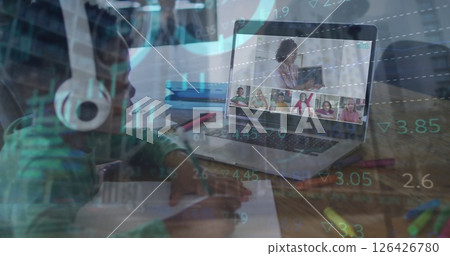 Image of financial data processing over african american boy online learning with laptop Image of financial data processing over african american boy online learning with laptop 126426780